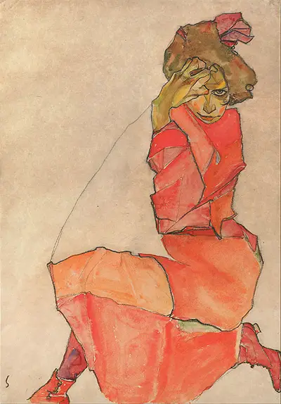 Hinknien Female in Orange Kleid Egon Schiele